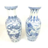 A Pair Of Large c1900 Blue And White Vases Depicting Mythical Beasts