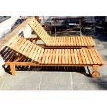 Two Teak Reclining Sun Loungers