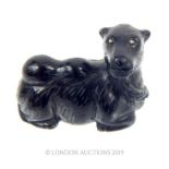 A Late Qing Early 20th Century Black Jade Camel