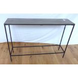 A Bronze Top Console Table.