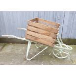 A Rustic Vintage Wheelbarrow Style Garden Planter