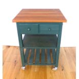 A District Styled Green Small Kitchen Island.
