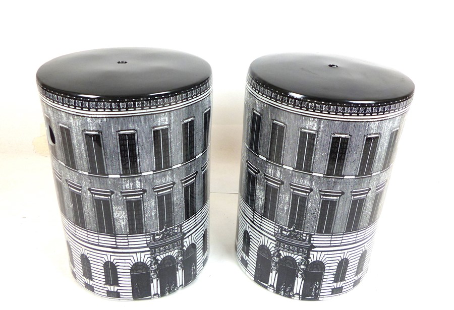 A Pair Of Ceramic Black And White Stools.