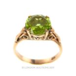 An 18ct Yellow Gold And Peridot Ring