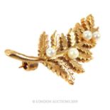 A 9ct Gold And Seed Pearl Brooch In The Form Of A Fern Leaf