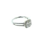 An 18 Carat White Gold Halo Style Ring Set With 75 Points Diamonds