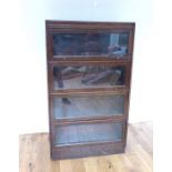 A Mid Century Solicitors Bookcase With Glass Fold Down Covers