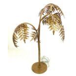A Gold Palm Tree Table Lamp.