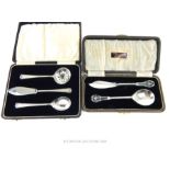 A Cased George VI Sterling Silver Jam Plus Sterling Silver Tea Serving Set.