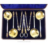 A Cased Set Of Seven Silver And Gilt Plates, Apostle Topped Serving Spoons Plus More.