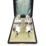 An Antique Cased Pair Edward Vll Solid Silver Sauce Boats.