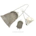 An Antique Sterling Silver Finger Purse Plus Two Sterling Silver Mesh Chain Purses.