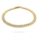 A Stunning 9 carat Gold Tennis Bracelet set with 44 single cut Diamonds