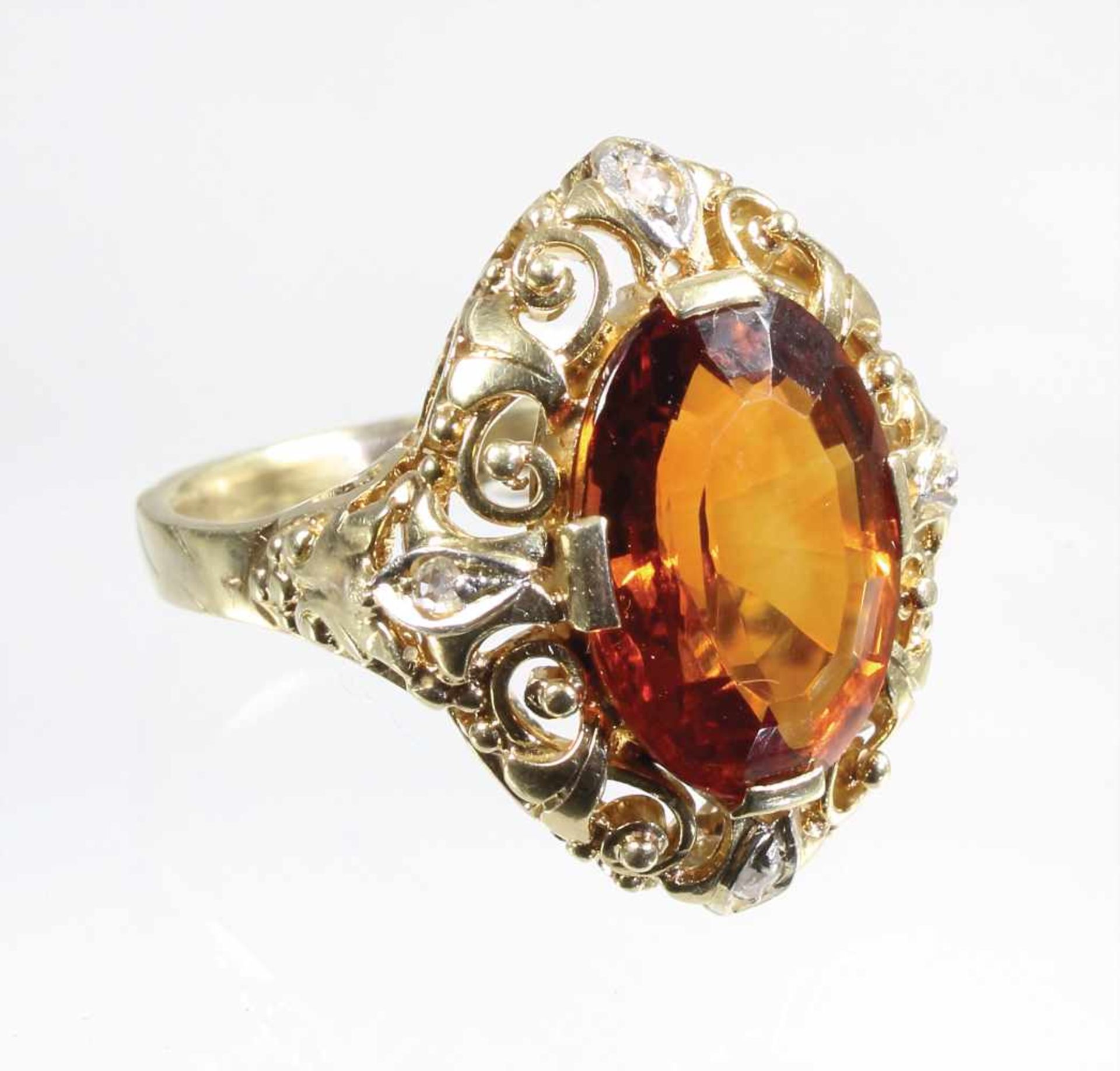 Ring Anfang 20.Jhd., GG 585/000, sig. RMO, wohl Citrin in leuchtend orangebrauner Farbe, ca. 6,0