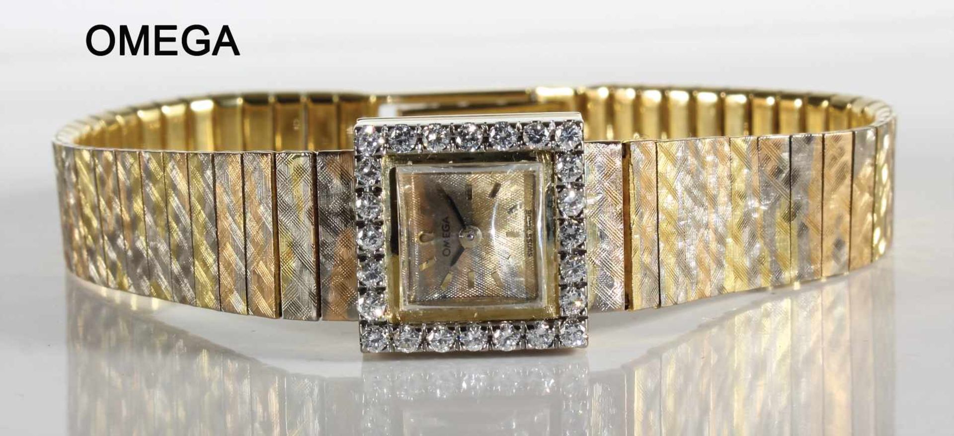 "VINTAGE", feine Damen-Armbanduhr, Omega Schweiz 1950er Jahre, GG 750/000, (changierende Farbtöne im