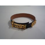 HERMES - CEINTURE en cuir et boucle en métal argenté. T.70. Longueur totale : 77 cm -