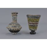 Two Islamic glass vessels 8.5cm height and 10cm he