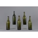 A group of five Victorian green glass wine bottles