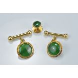 Gold and jadeite cufflinks and stud.