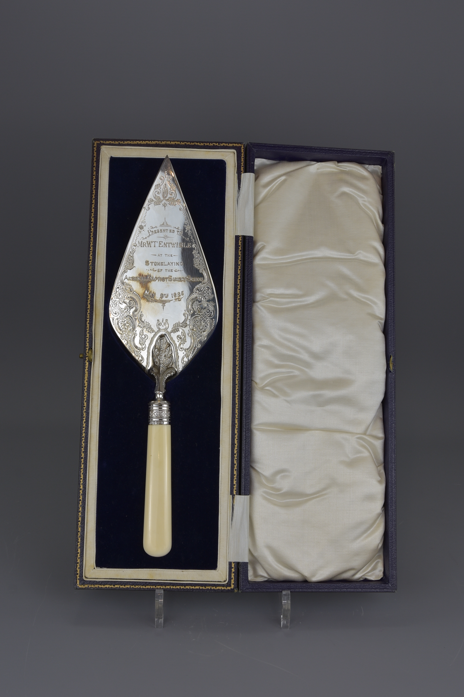 An English antique presentation trowel dated 13th