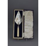 An English antique presentation trowel dated 13th