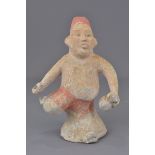 A Chinese Han dynasty painted pottery figure holdi