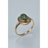 10ct gold ring with green stone. Size O