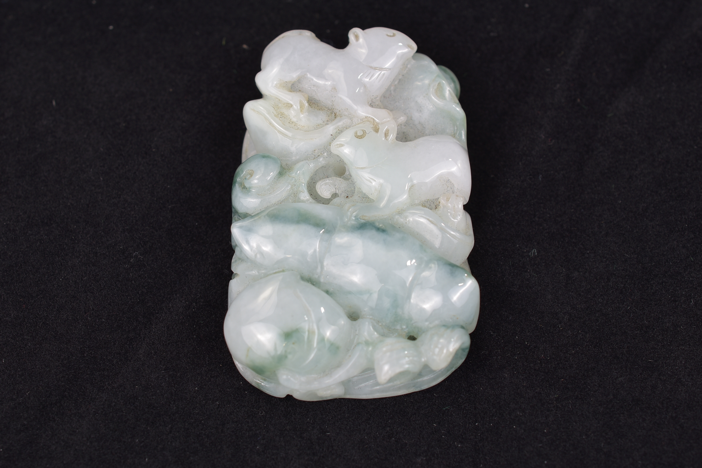 A Chinese carved jadeite pendant. 5 cm. - Image 6 of 6