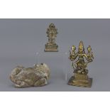 Two bronze deities and Asin stone weight. 14.5cm h