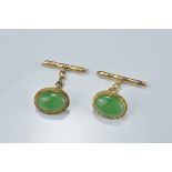 Gold and jadeite cufflinks.