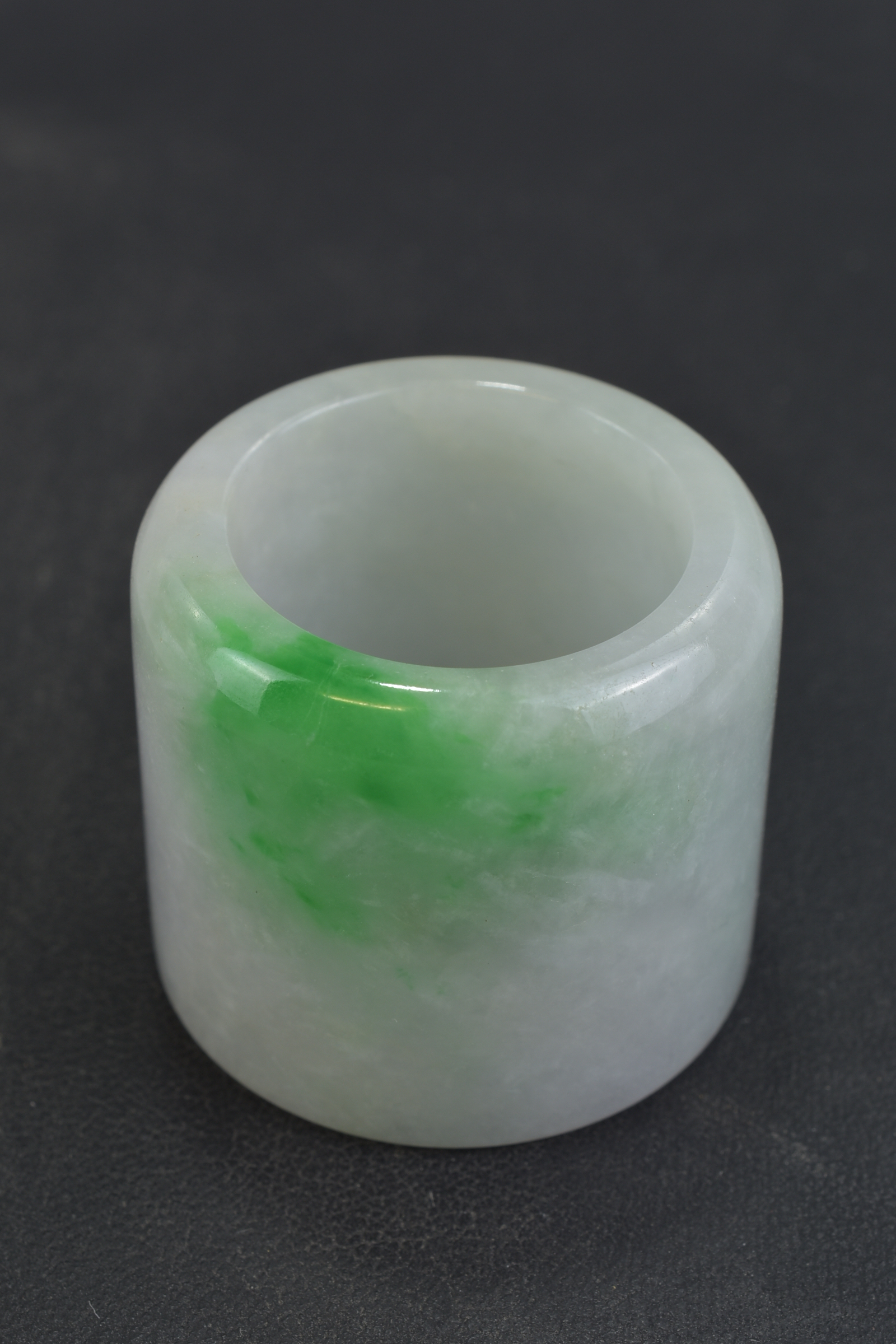 A Chinese jadeite archers ring. 3cm x 3.2cm