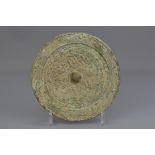 A Chinese Han dynasty bronze mirror with character