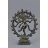 An Indian bronze standing goddess. 10 cm tall.