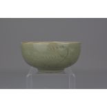 A Chinese Yuan dynasty celadon porcelain bowl. 14c