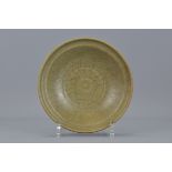 A Chinese Ming Dynasty celedon dish. 18.5 cm diame