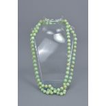 String of 108 jadeite beads in a necklace