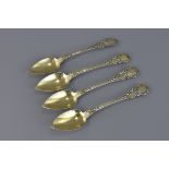 A set of four French silver gilt spoons 14.5cm len
