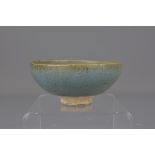 A small Chinese Yuan dynasty Jun ware bowl with pu