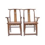 A pair of Chinese 20th century elm wood Officials