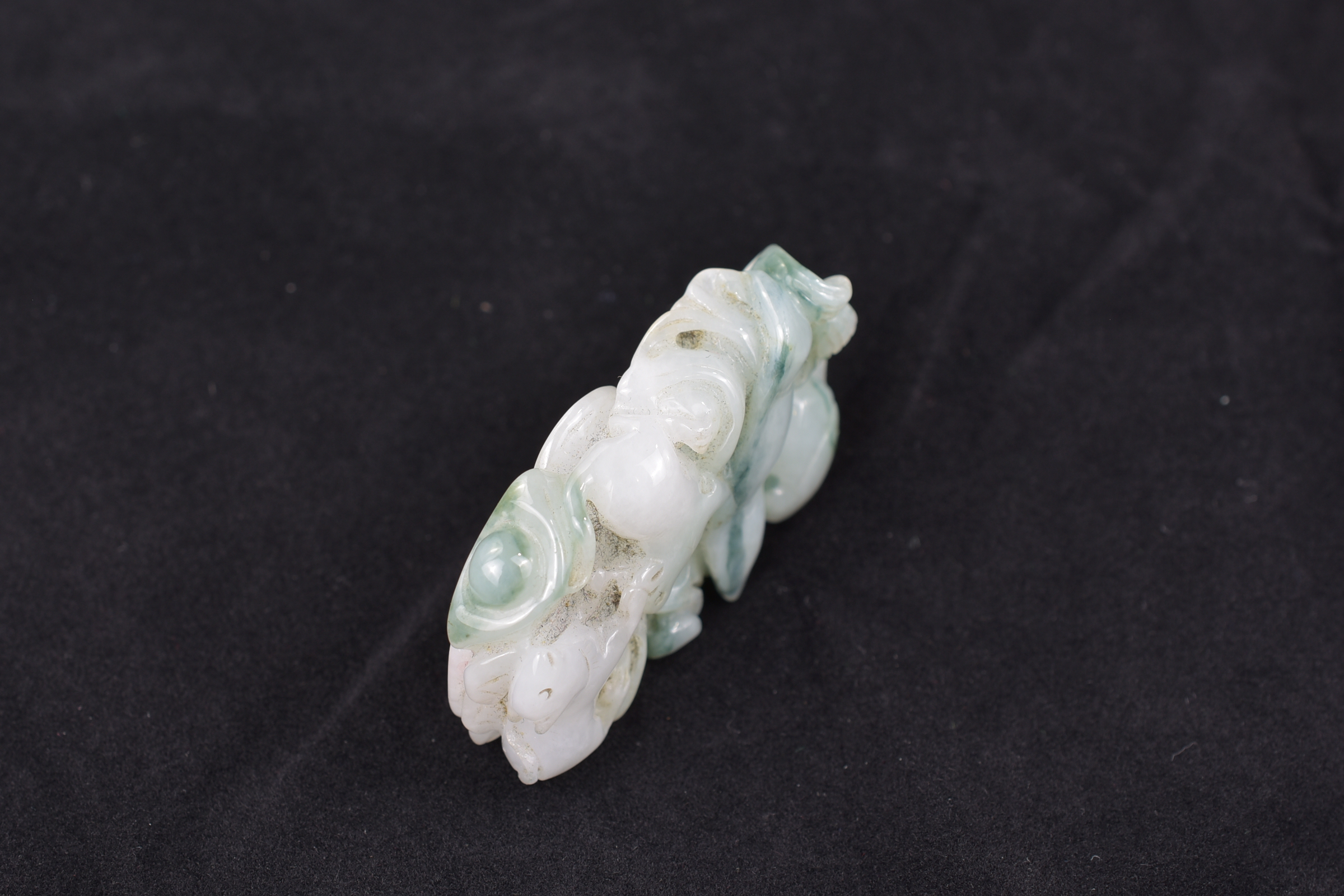 A Chinese carved jadeite pendant. 5 cm. - Image 4 of 6