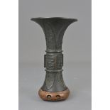 A Chinese Ming Dynasty "Gu" shape bronze beaker wi