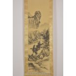 A Japanese ink painting in scroll depicting a moun