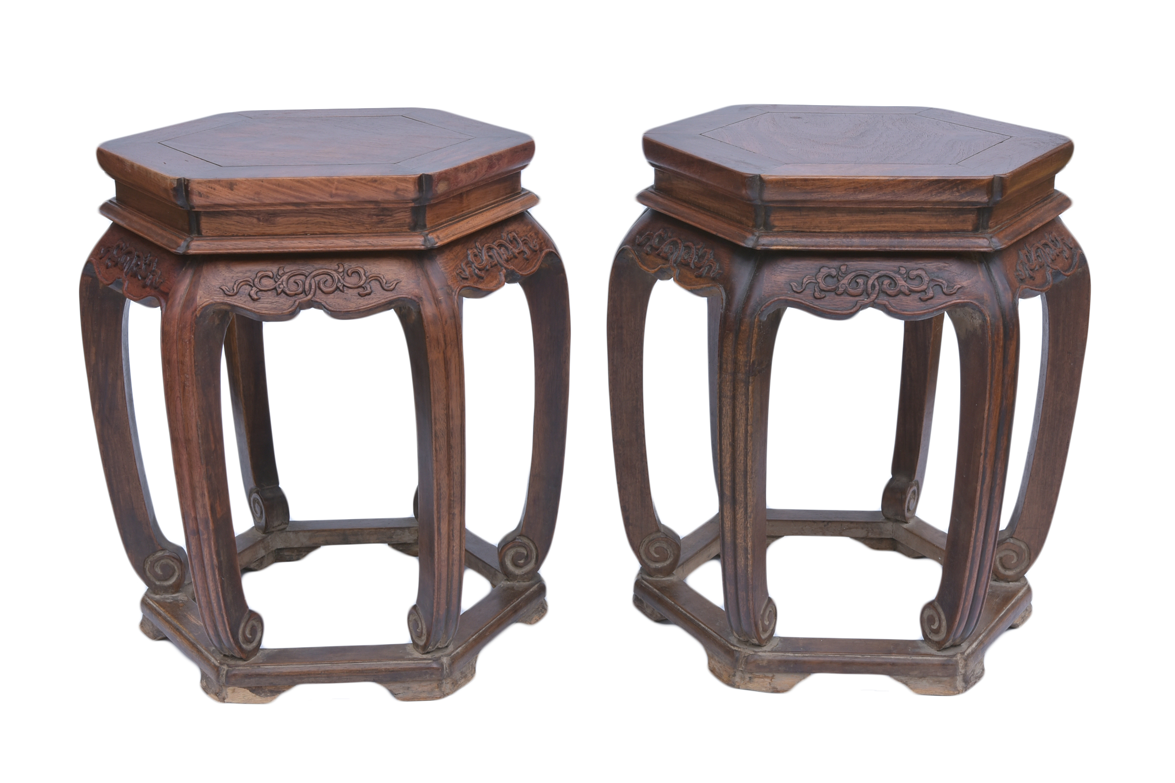 A pair of Chinese 19th century hardwood stools wit