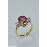 18ct gold ruby and diamond ring. Size O