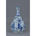 A Chinese Ming Dynasty garlic-shaped porcelain vas