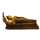A very large 19th C Thai gilt bronze Buddha. Heavily cast 122.5cm length