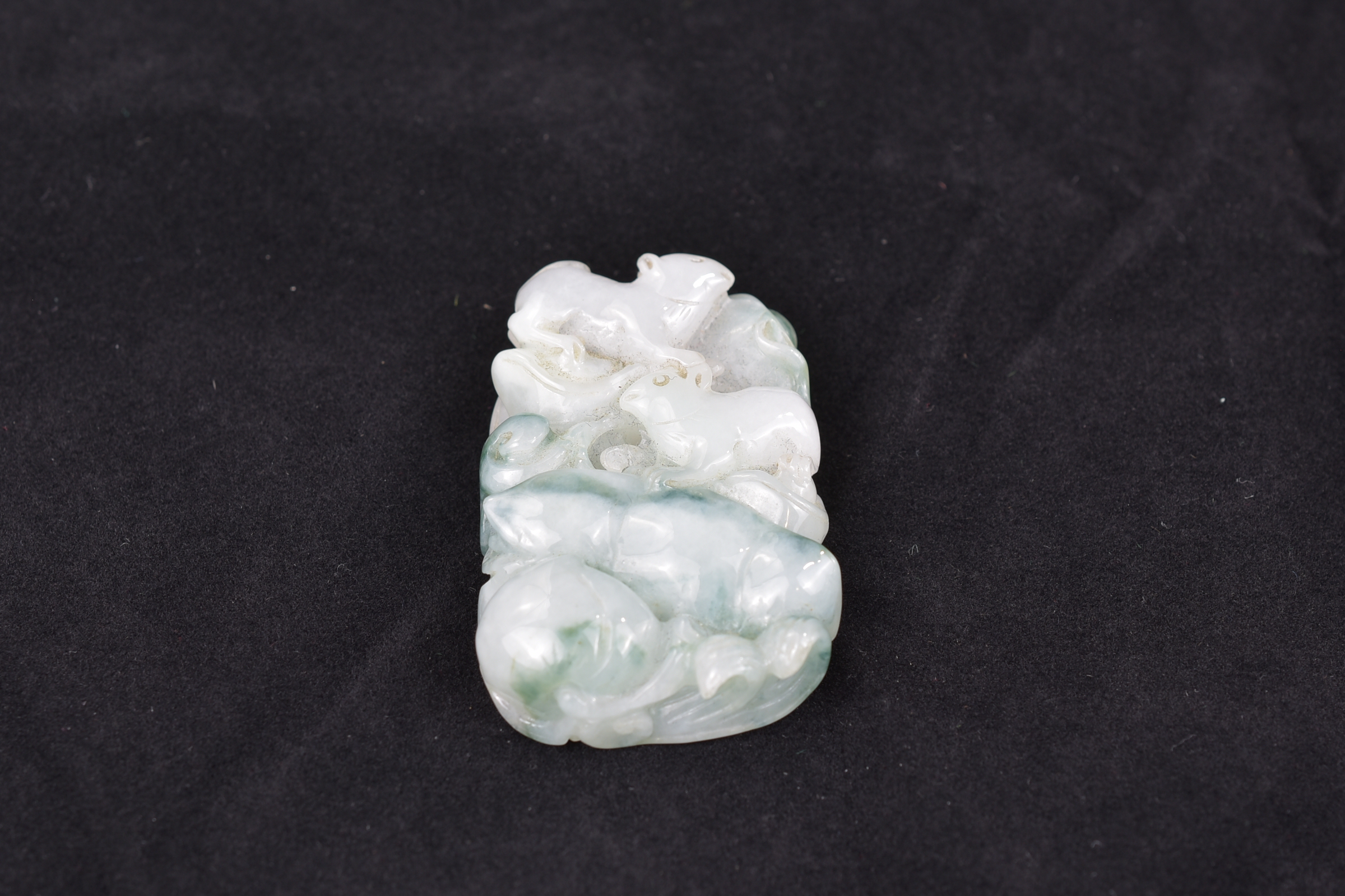 A Chinese carved jadeite pendant. 5 cm. - Image 5 of 6