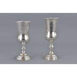 Two Kiddush silver cups one with mark stamped 84.