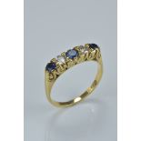 18ct gold ring with sapphire and diamonds. Size N
