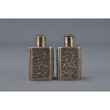 A pair of Chinese export silver salt and pepper shakers circa 1900 marked WH90 - Wang Hing